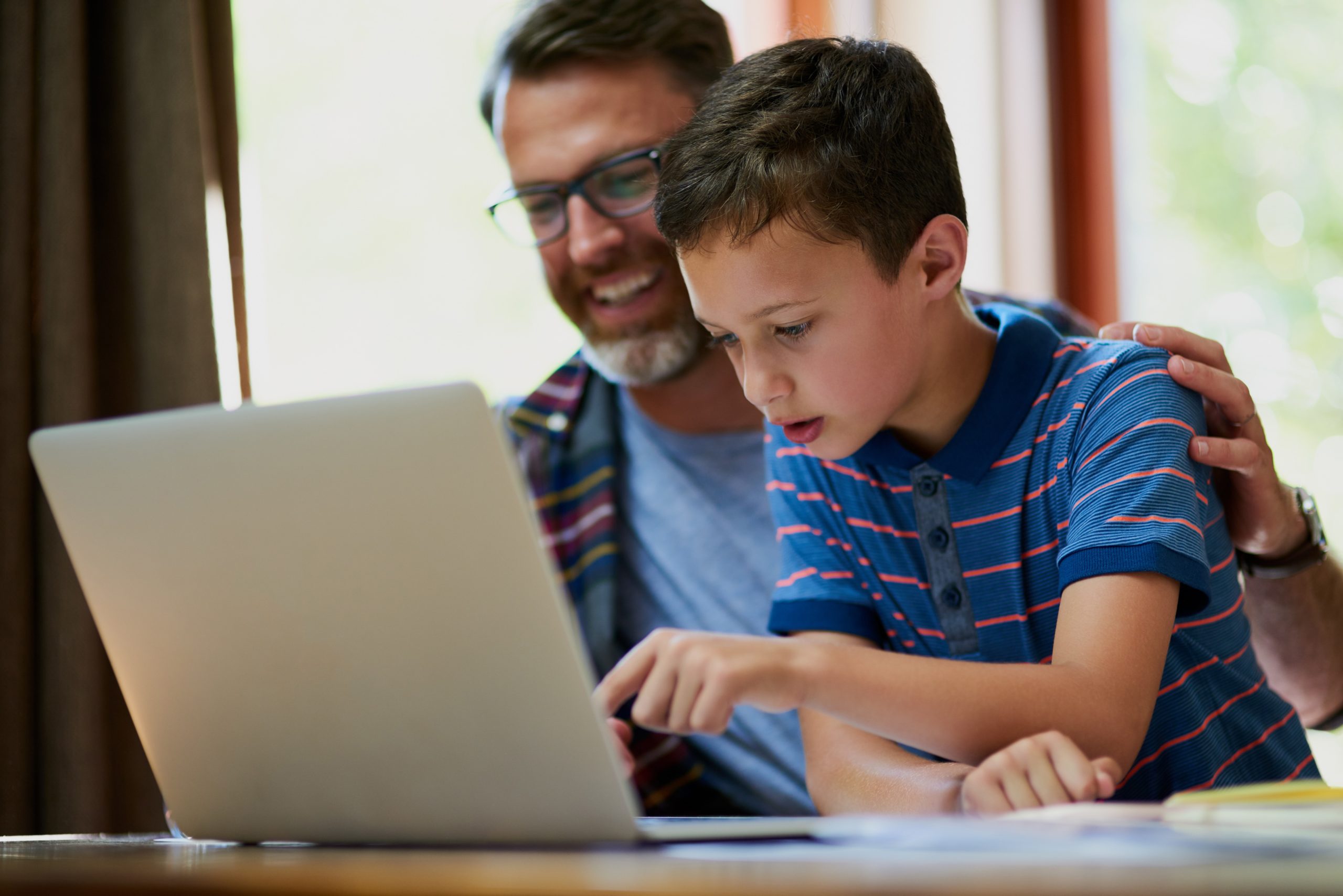 happy-father-boy-online-learning-with-laptop-assignment-project-education-home-dad-child-son-with-smile-computer-research-elearning-virtual-assessment-table-house